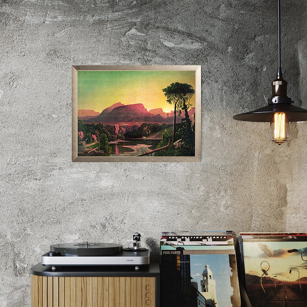 A print of a chromolithograph from 1880 depicting dawn over the Allegheny Mountains, with a purple and green horizon, golden mist-covered peaks on a concrete wall.